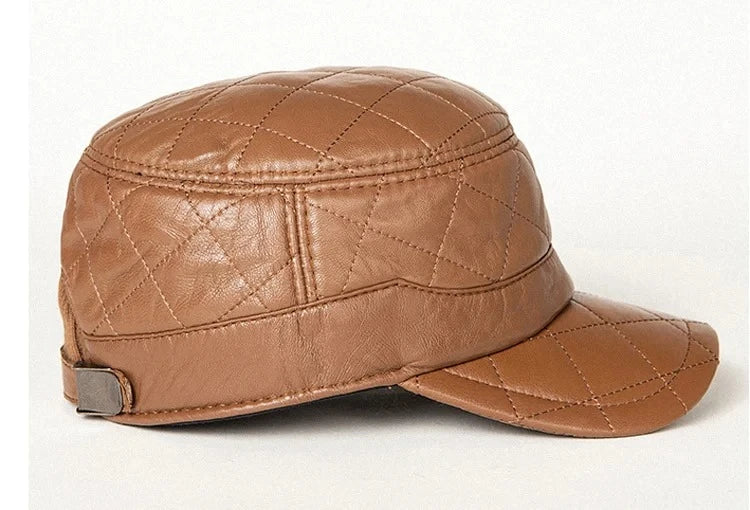 A stylish men's peaked cap made from genuine leather with a rhombus dome design and short brim