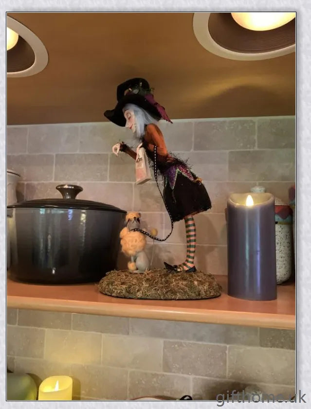 Enchanting Halloween witch figurine with unique designs and meticulous hand-painted details