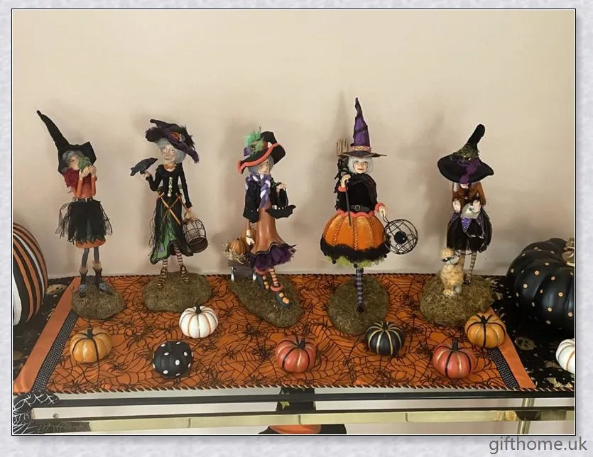 Enchanting Halloween witch figurine with unique designs and meticulous hand-painted details