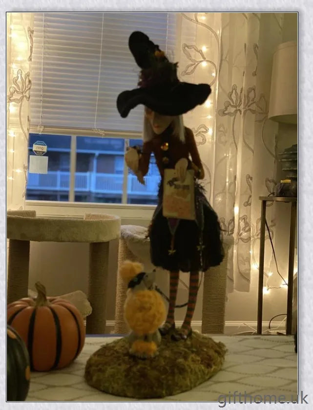 Enchanting Halloween witch figurine with unique designs and meticulous hand-painted details