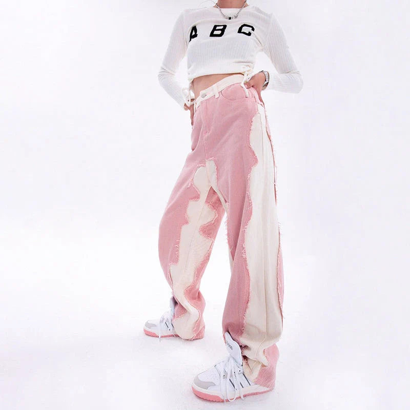 Model wearing high-waisted, wide-leg pink denim jeans with a stylish and comfortable fit