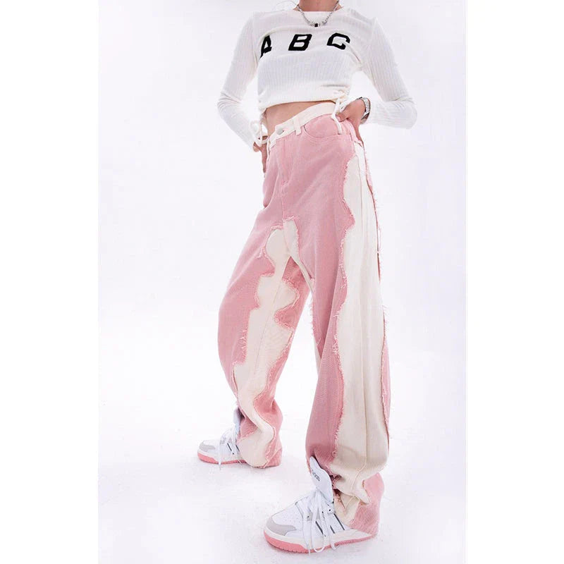 Model wearing high-waisted, wide-leg pink denim jeans with a stylish and comfortable fit