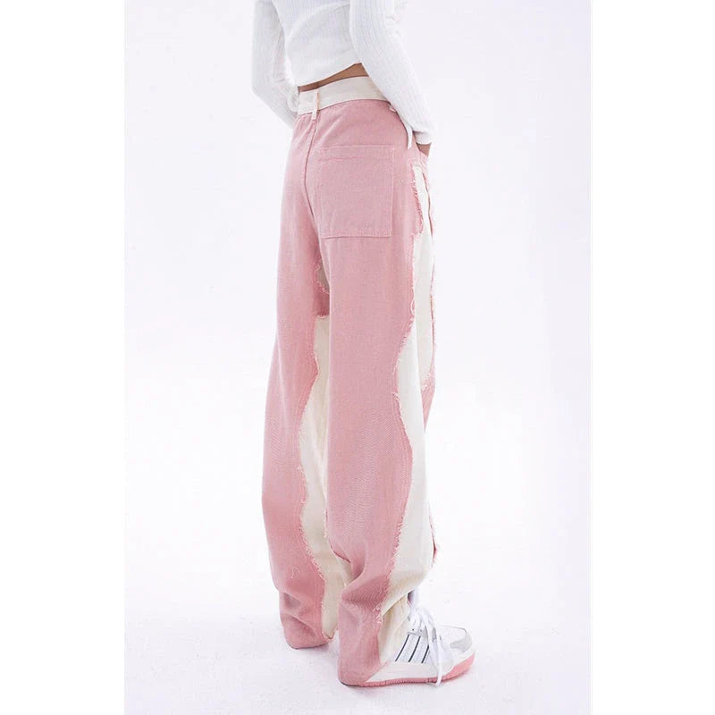 Model wearing high-waisted, wide-leg pink denim jeans with a stylish and comfortable fit