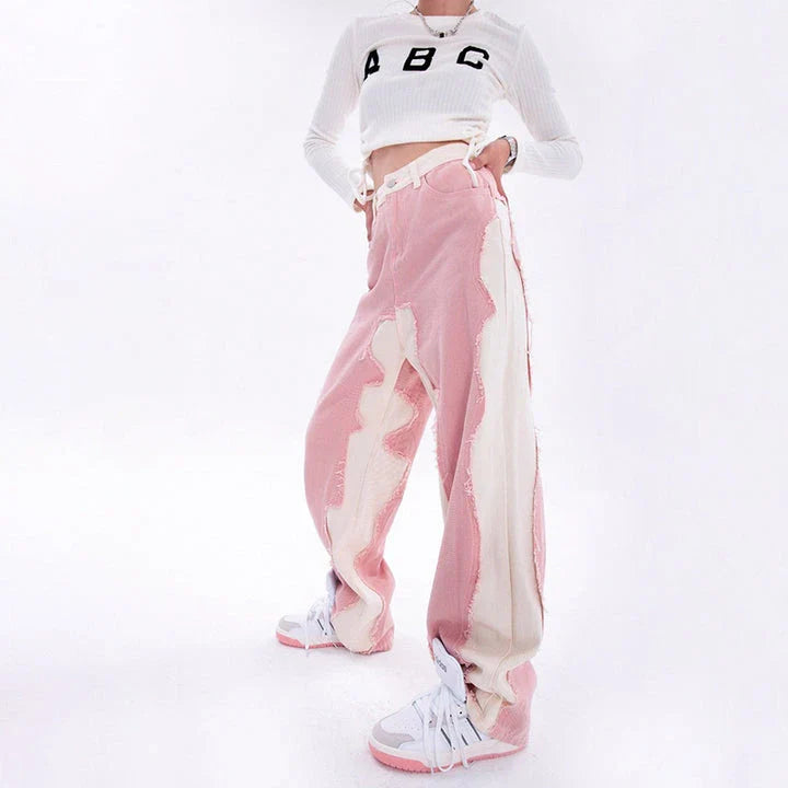 Model wearing high-waisted, wide-leg pink denim jeans with a stylish and comfortable fit