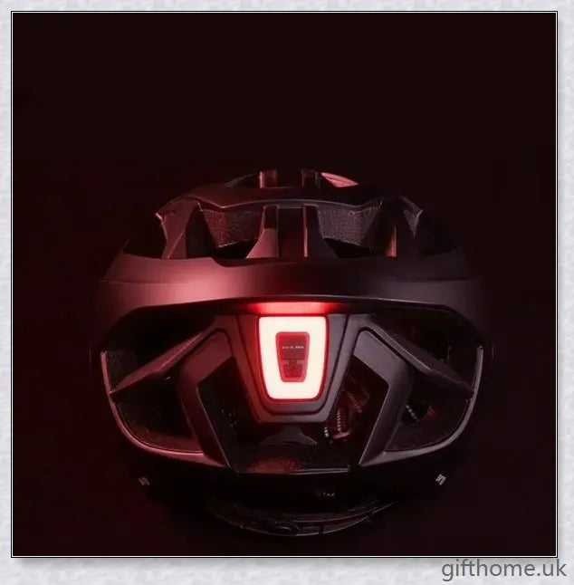 A stylish and functional bicycle helmet with a built-in rechargeable LED light for enhanced visibility and safety during cycling.
