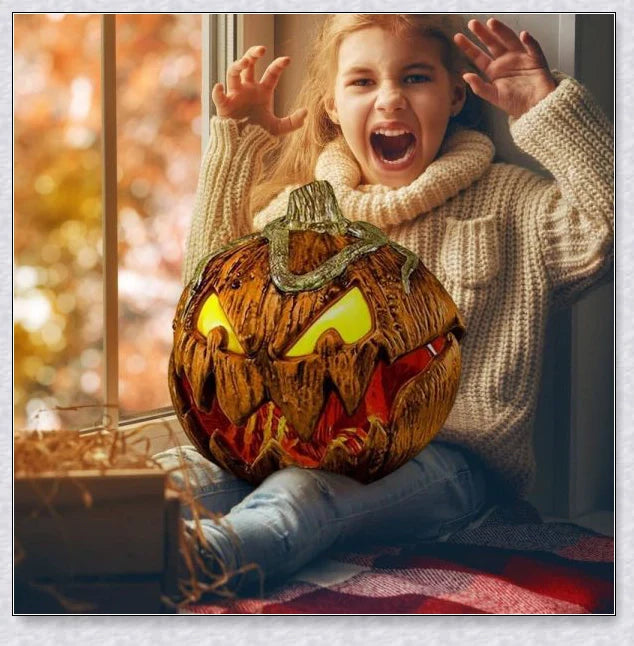 A yellow pumpkin decoration with a mouth that opens and makes spooky sounds, perfect for adding a chilling touch to your outdoor Halloween party.