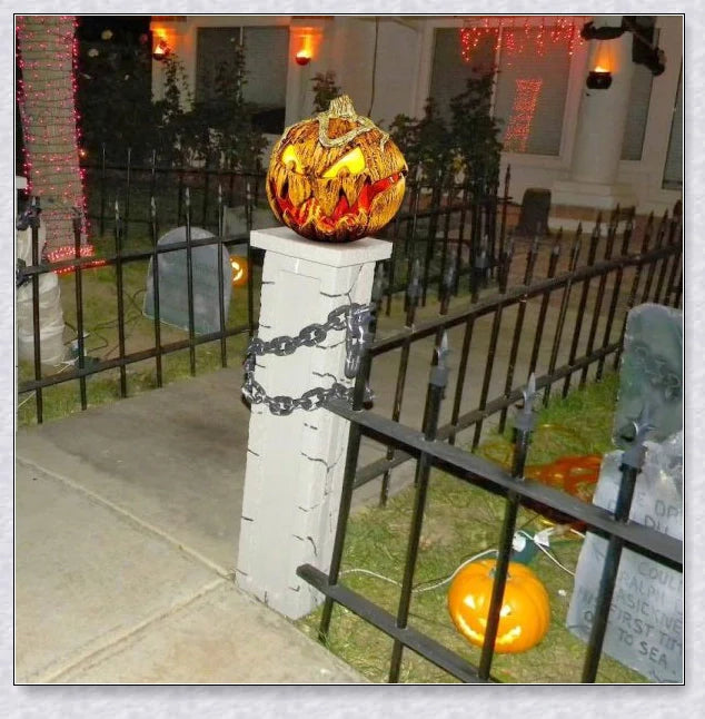 A yellow pumpkin decoration with a mouth that opens and makes spooky sounds, perfect for adding a chilling touch to your outdoor Halloween party.