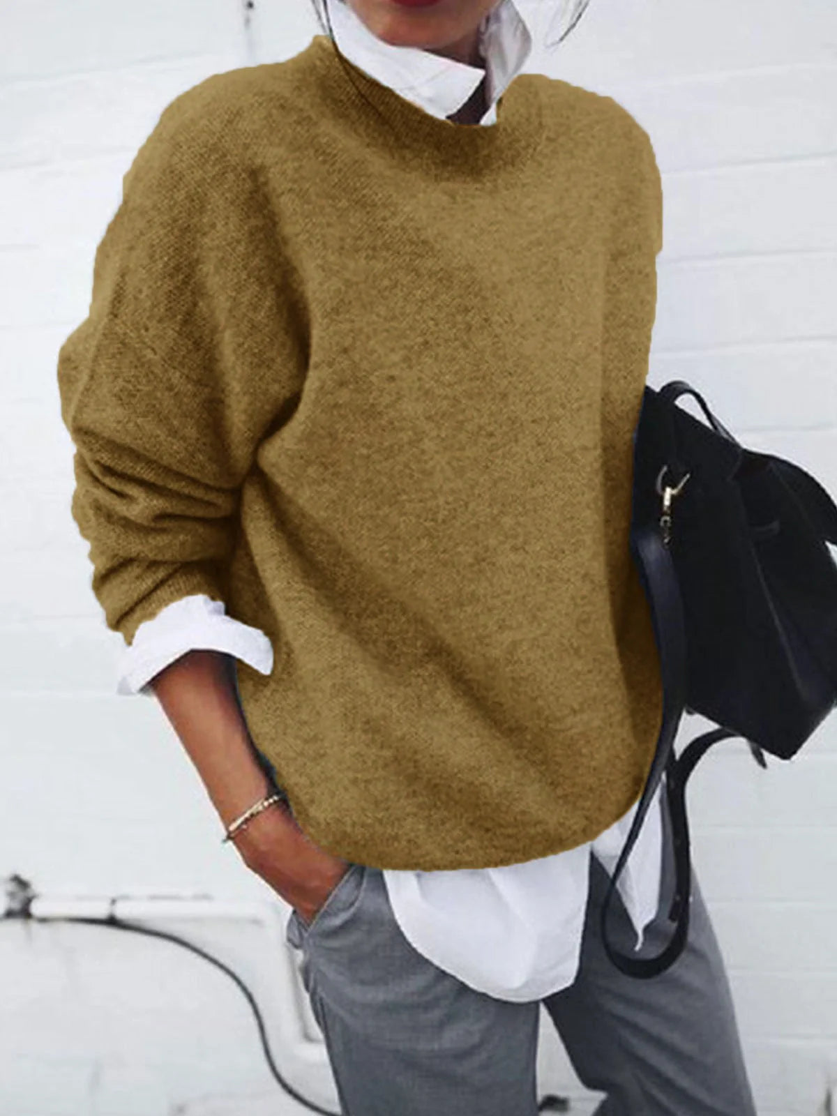 A long sleeve knitted jumper in various solid colours, including light gray, black, khaki, blue, and pink