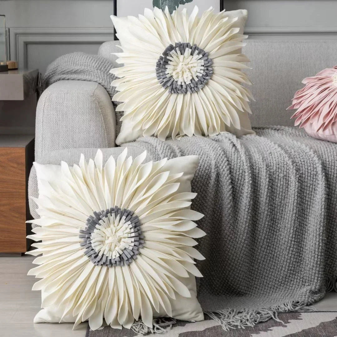 Decorative throw pillows in various colours featuring 3D chrysanthemum embroidery on a velvet surface
