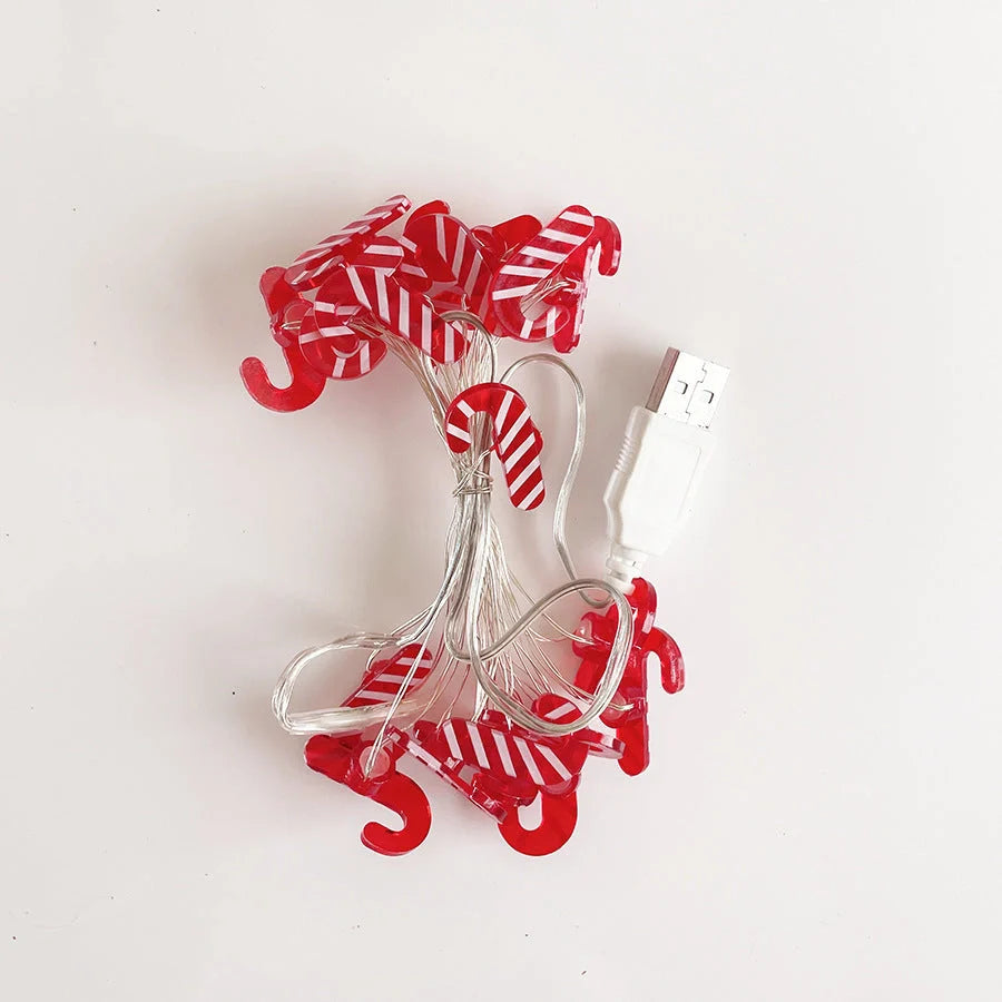 Festive LED string lights with Christmas-themed ornaments for home and party decor