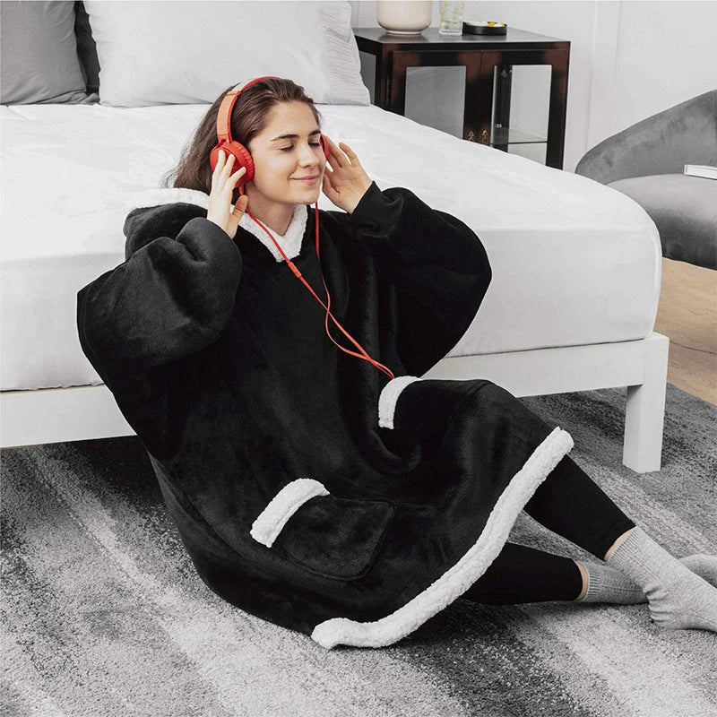 Comfy oversized TV hoodie blanket in various stylish colors, perfect for cozy movie nights and relaxation at home.