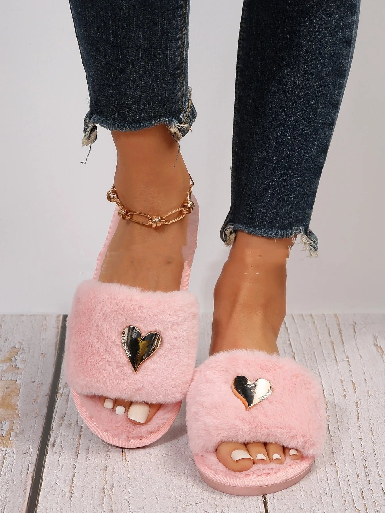 Cosy faux fur slippers in various colours for comfortable indoor wear