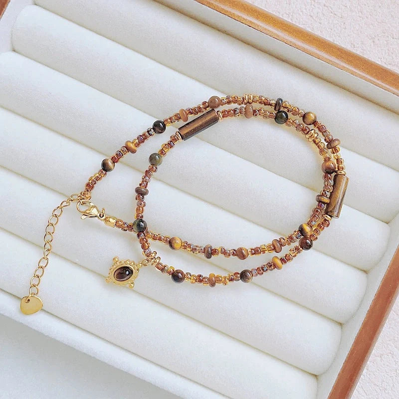 Maillard Colour Necklace with geometric pendant designs in titanium steel