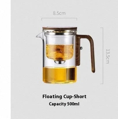 Smart one-button magnetic tea infuser pot with wooden handle, featuring heat-resistant borosilicate glass construction and seamless tea brewing experience.