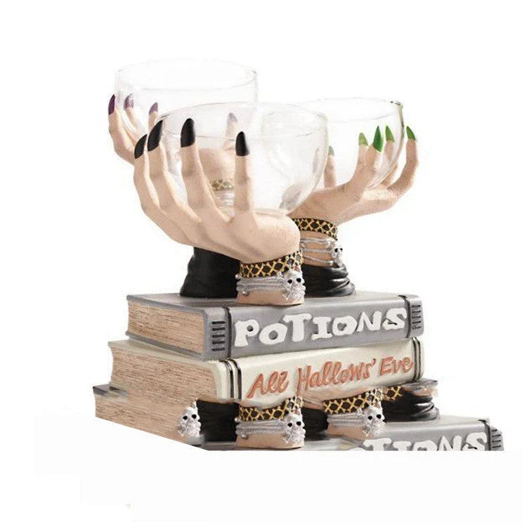 Bewitching Halloween snack bowl stand with transparent bowls and unique witch's hand design