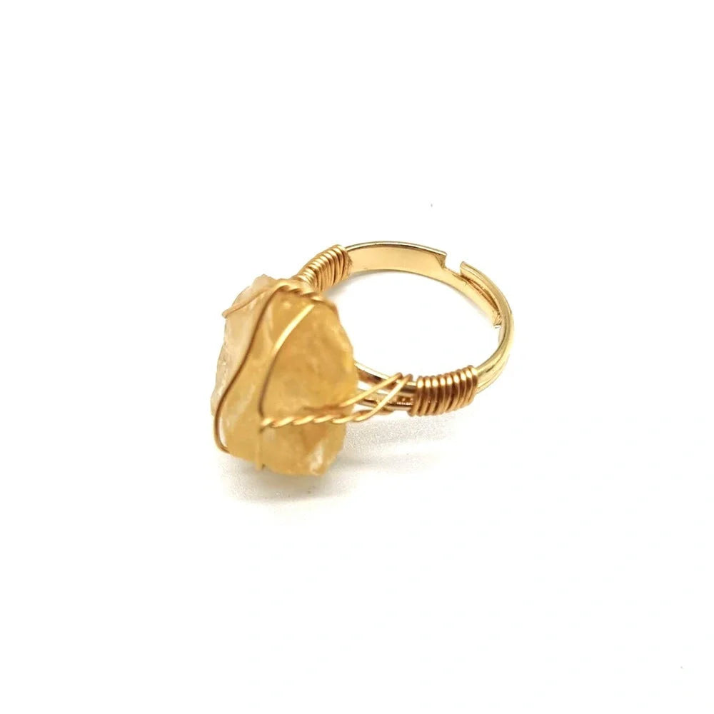 Handcrafted agate stone ring featuring an array of natural gemstones in various colours, with an adjustable design for a customized fit.