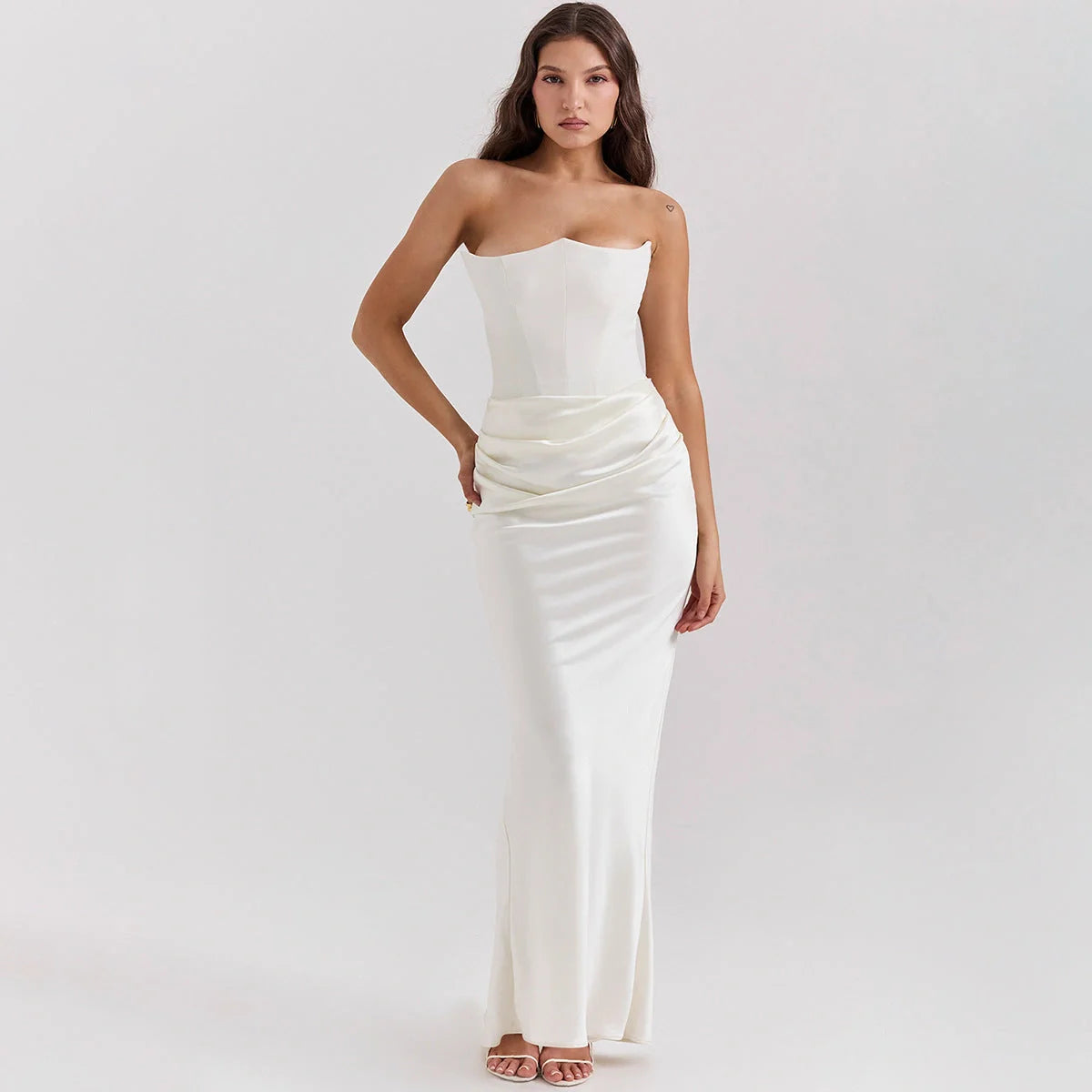 Elegant backless tube top dress in a variety of colours, featuring a sleek and sophisticated design for special occasions