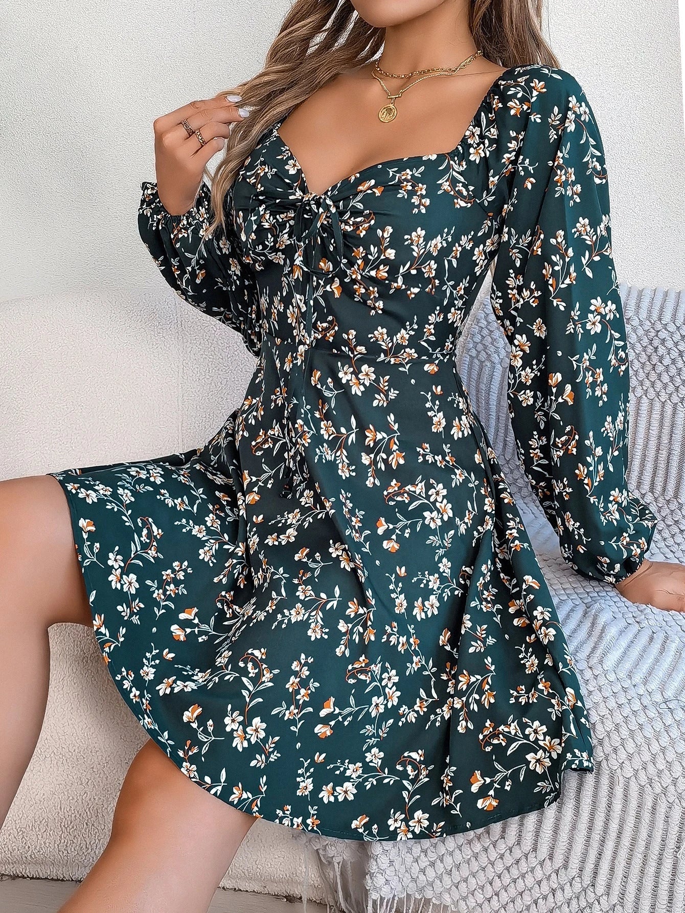 Stunning floral dress with trendy lantern sleeves, featuring a chic A-line silhouette and vibrant color options