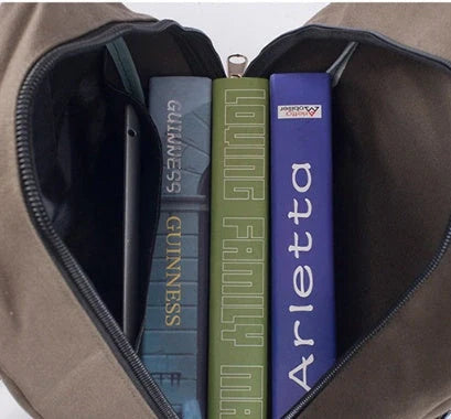 Men's canvas backpack with zippered opening, available in multiple colours including coffee, light khaki, and black.