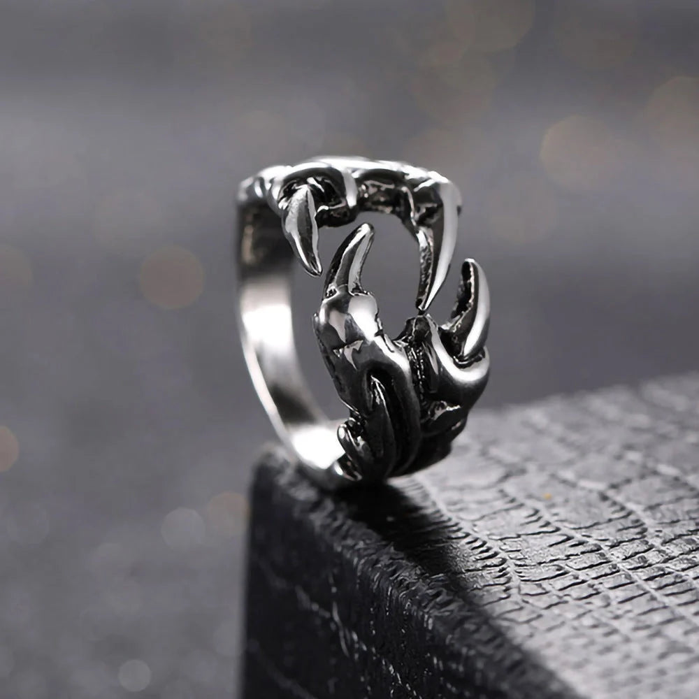 Striking open dragon claw ring made from premium titanium steel, with a lustrous chrome-like finish and adjustable, comfortable fit