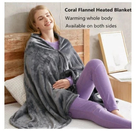 Cozy electric heated blanket made of soft, plush coral fleece with adjustable temperature settings and USB connectivity for portable warmth