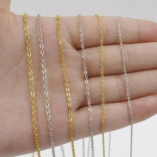 Heart-shaped pendant necklace with adjustable chain in various metallic finishes