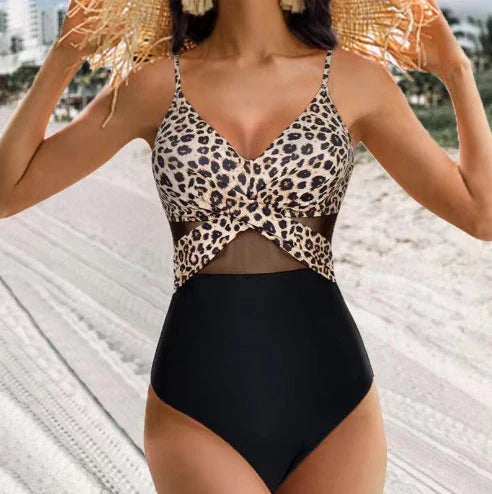 Stylish halter-neck one-piece swimsuit in various colors with cross-strap details and mesh design, perfect for summer beach and vacation wear