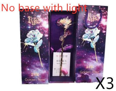 A luxurious 24K gold-plated rose flower bouquet set with a gift box and tote bag