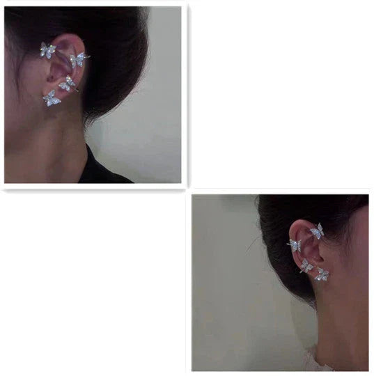 Chic butterfly ear clips in gold and silver tones, featuring a unique and elegant design for fashion-forward style.