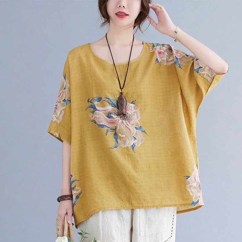 Stylish cotton-blend summer top in yellow and orange colours, featuring a conventional sleeve design and premium natural fabrics