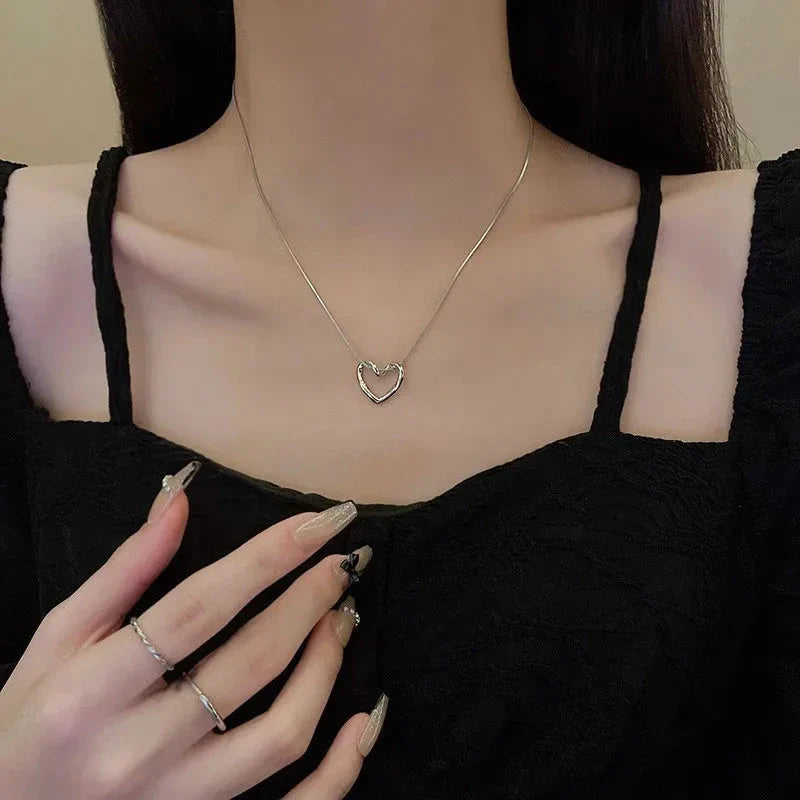 Stylish Titanium Steel Heart Pendant Necklace - Perfect Gift for Bold and Chic Ladies