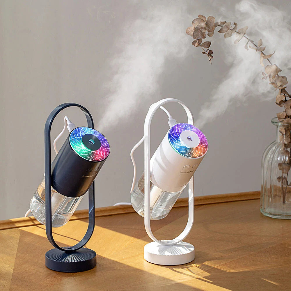 Compact USB Powered Desktop Humidifier with Ambient Lighting, featuring adjustable mist nozzle and romantic starry projection