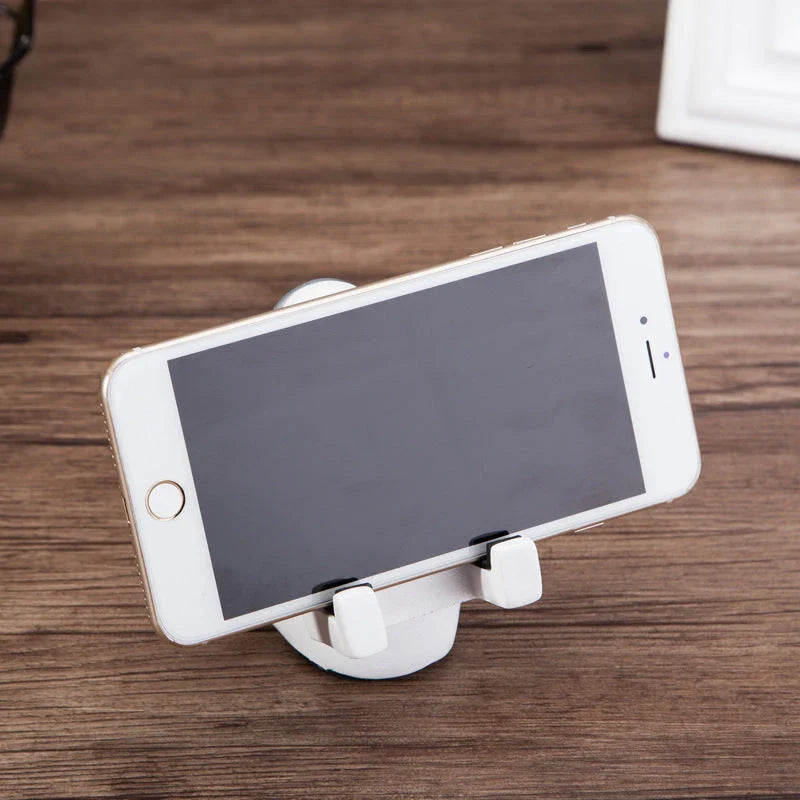 Charming astronaut-themed mobile phone stand made of high-quality resin, designed to securely hold your phone on your desk or workspace