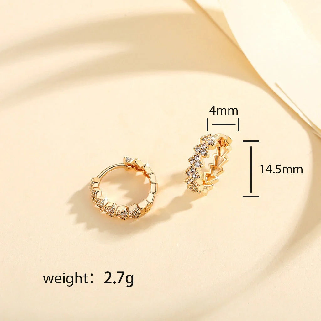 Premium copper-plated gold and zircon stud earrings in a classic design, exuding British elegance and sophistication