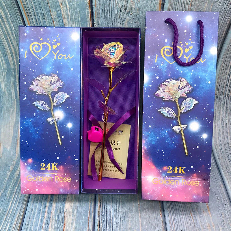 A luxurious 24K gold-plated rose flower bouquet set with a gift box and tote bag