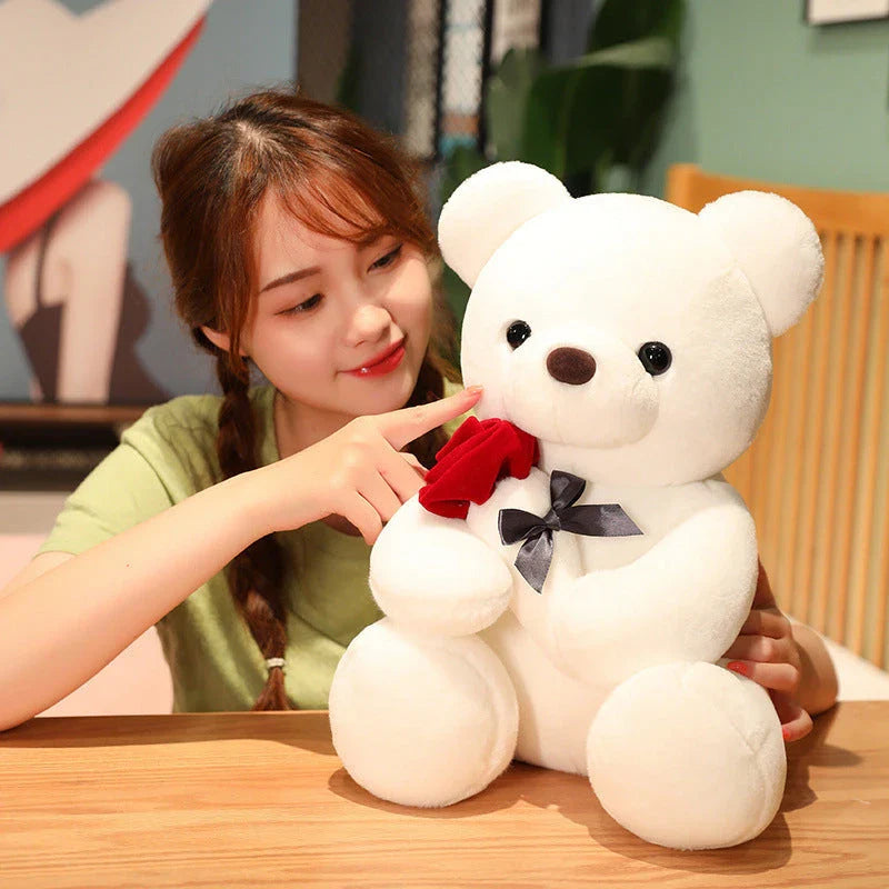 Soft and huggable teddy bear plush pillow in brown, beige, and grey colors