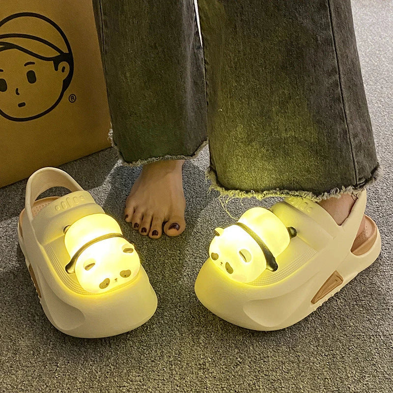 Adorable panda-themed slip-on slippers in various colors and sizes, featuring a lightweight and breathable design for comfortable everyday wear.