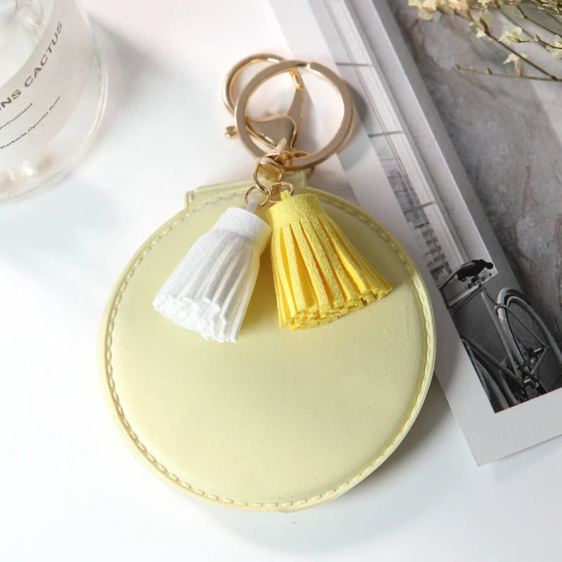 Mini round PU leather small mirror with lovely tassel in various colours
