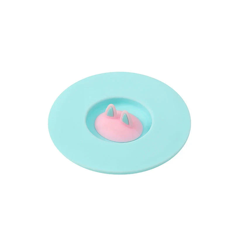 Spill-Proof Cat Ear Silicone Drink Lid in various colors, including pink, orange, and blue
