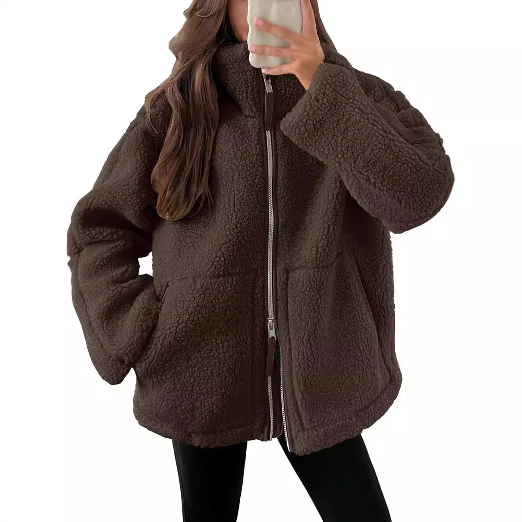 Classic padded fleece jacket in various colours for women, featuring a zip-up design and pockets
