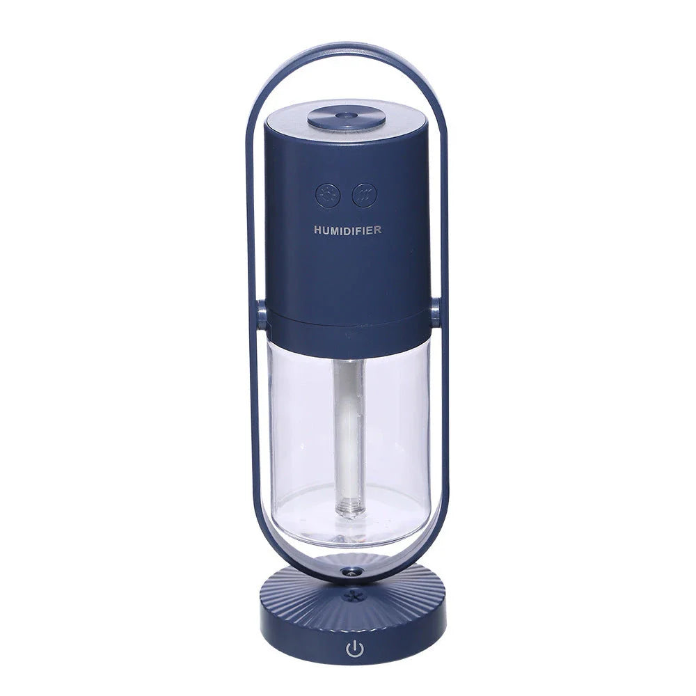 Compact USB Powered Desktop Humidifier with Ambient Lighting, featuring adjustable mist nozzle and romantic starry projection