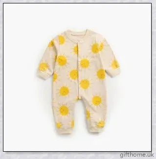 A cosy baby romper with charming cartoon designs, made from soft and breathable cotton fabric.