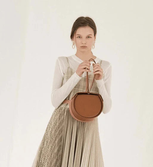 Stylish drawstring shoulder bag made with premium artificial leather for modern British lifestyle