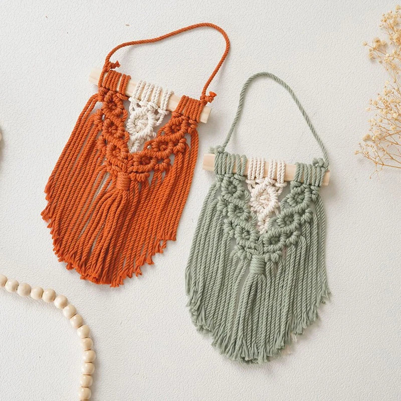 Handmade macrame wall hanging tapestry in creamy-white colour, featuring intricate patterns and natural textures