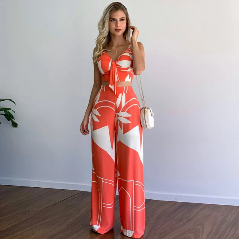 Linen two-piece set with v-neck vest and wide-leg printed trousers in various colours