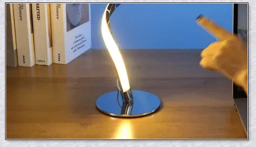 Stylish modern spiral table lamp with adjustable brightness and three colour modes