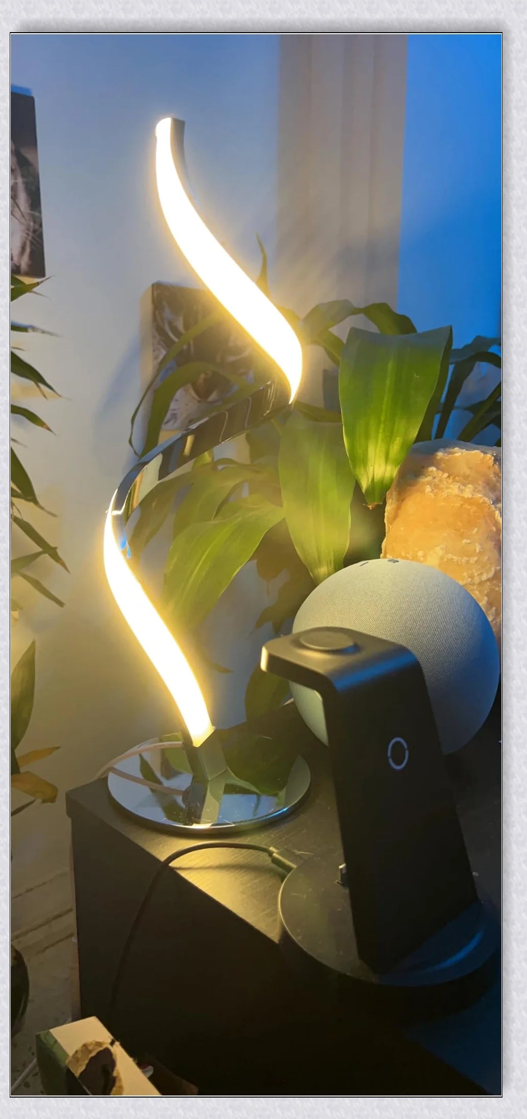 Stylish modern spiral table lamp with adjustable brightness and three colour modes