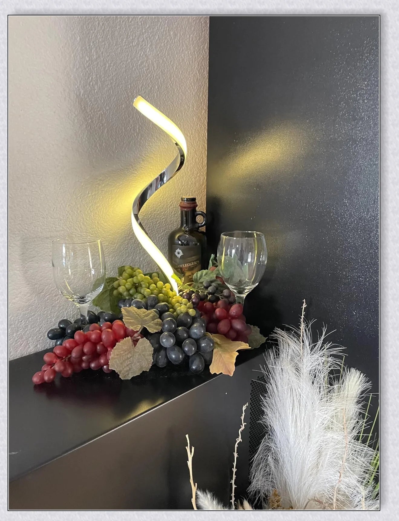 Stylish modern spiral table lamp with adjustable brightness and three colour modes