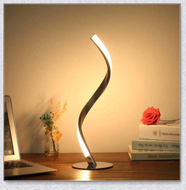Stylish modern spiral table lamp with adjustable brightness and three colour modes