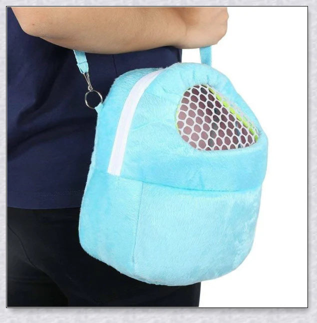 Soft, sponge-padded Rabbit Travel Carrier with breathable mesh top and adjustable shoulder strap for comfortable, hands-free transport of small pets.